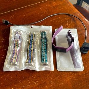 Fitbit Charge 4, interchangeable straps, and charger